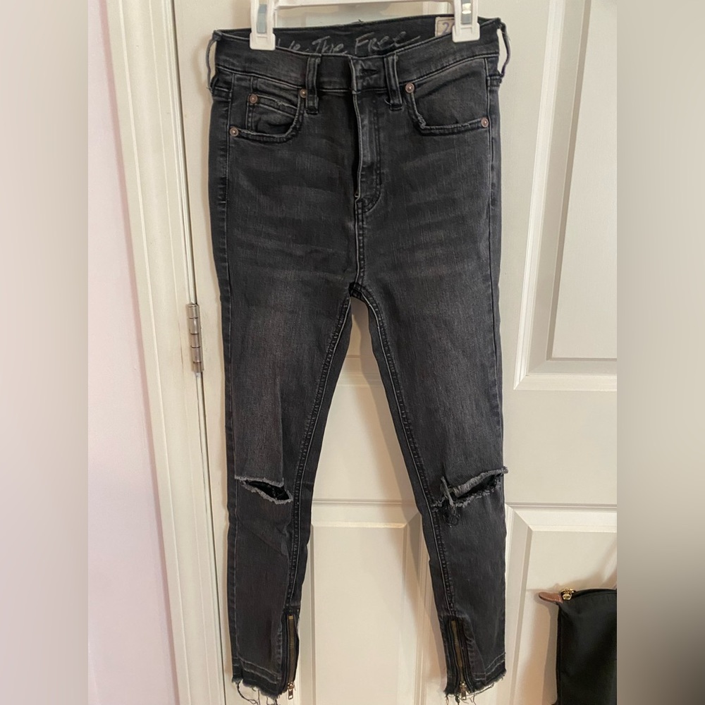 Free People skinny jeans- busted knees and zipper hem - 26